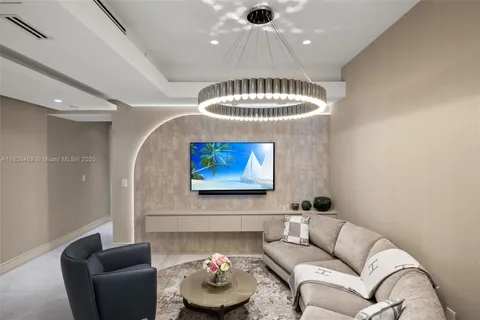 a view of a potted flower in a yard with swimming pool