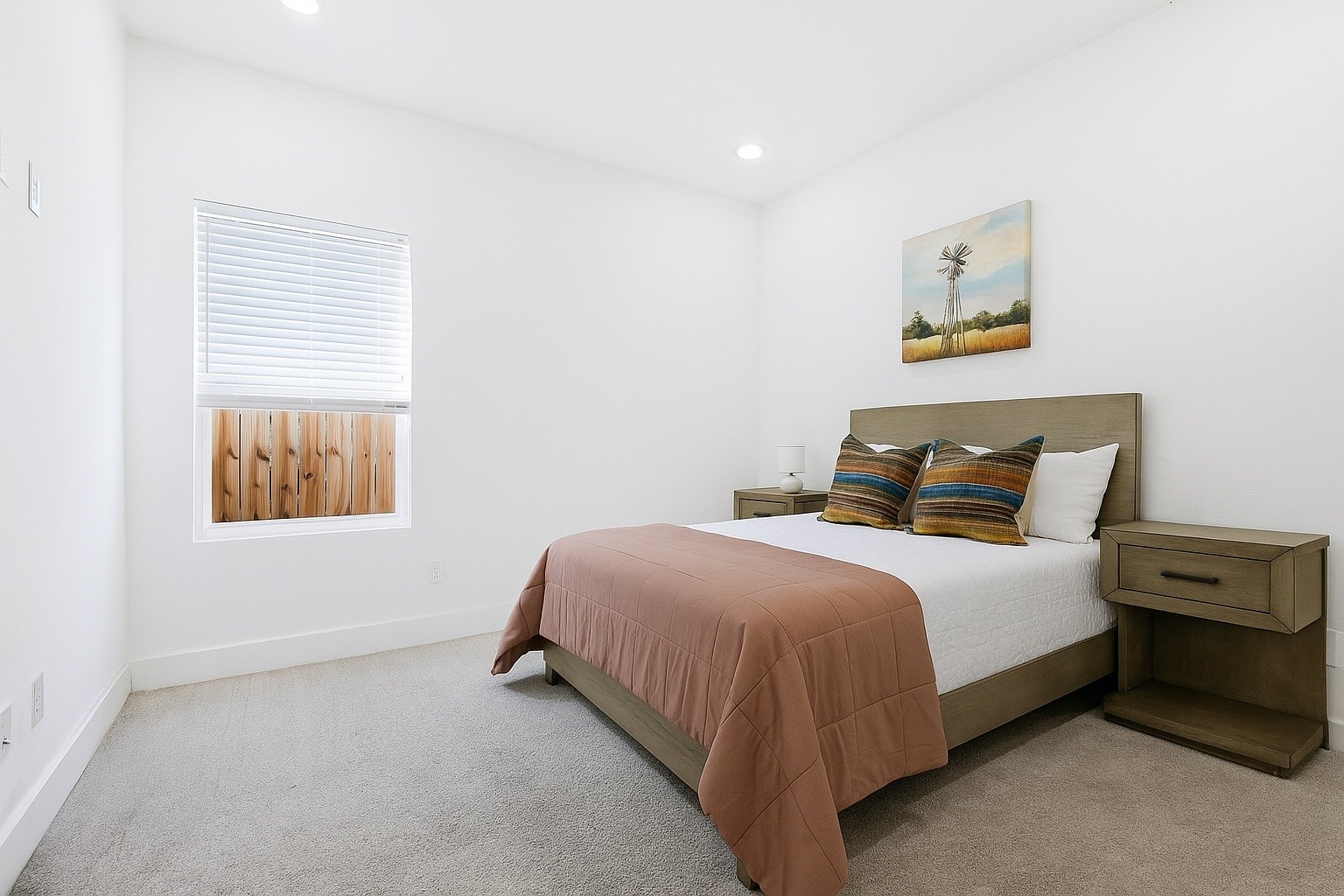 107 West Whitney Street, Unit C Houston, TX 77018 - Photo 21 of 27 a bedroom with a bed and a window