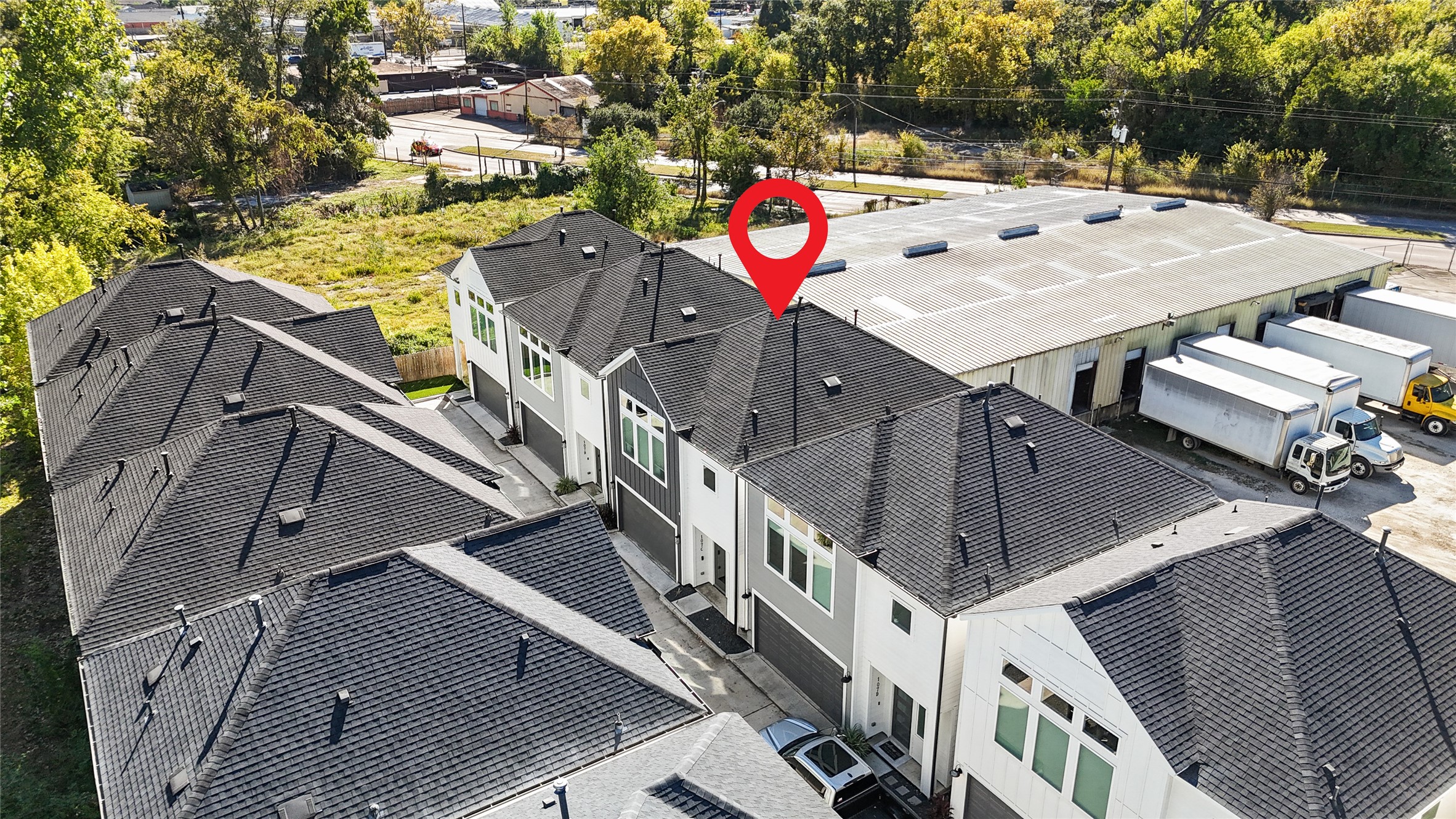 107 West Whitney Street, Unit C Houston, TX 77018 - Photo 24 of 27 an aerial view of residential houses with outdoor space