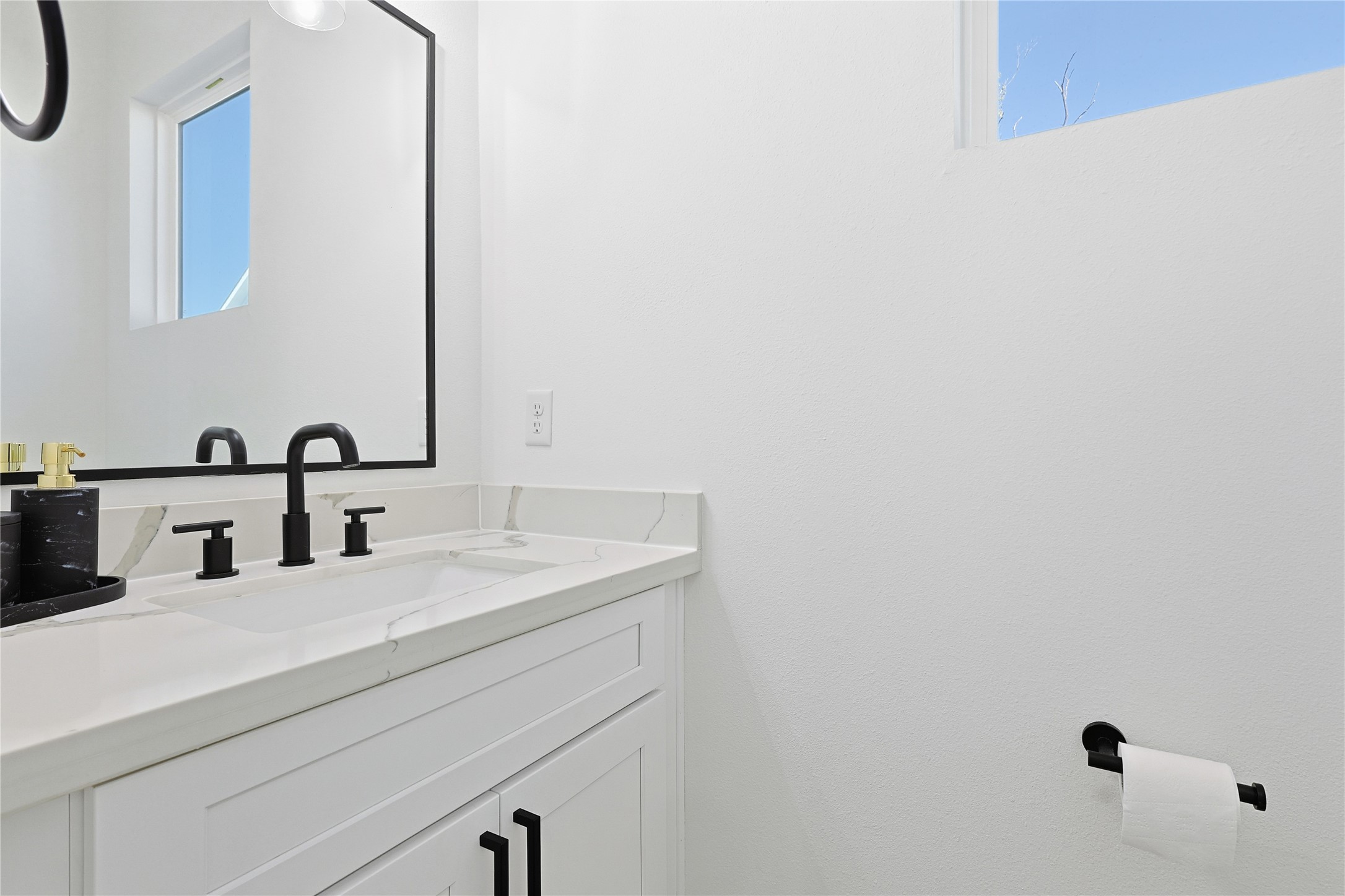 107 West Whitney Street, Unit C Houston, TX 77018 - Photo 9 of 27 a bathroom with a sink and a mirror
