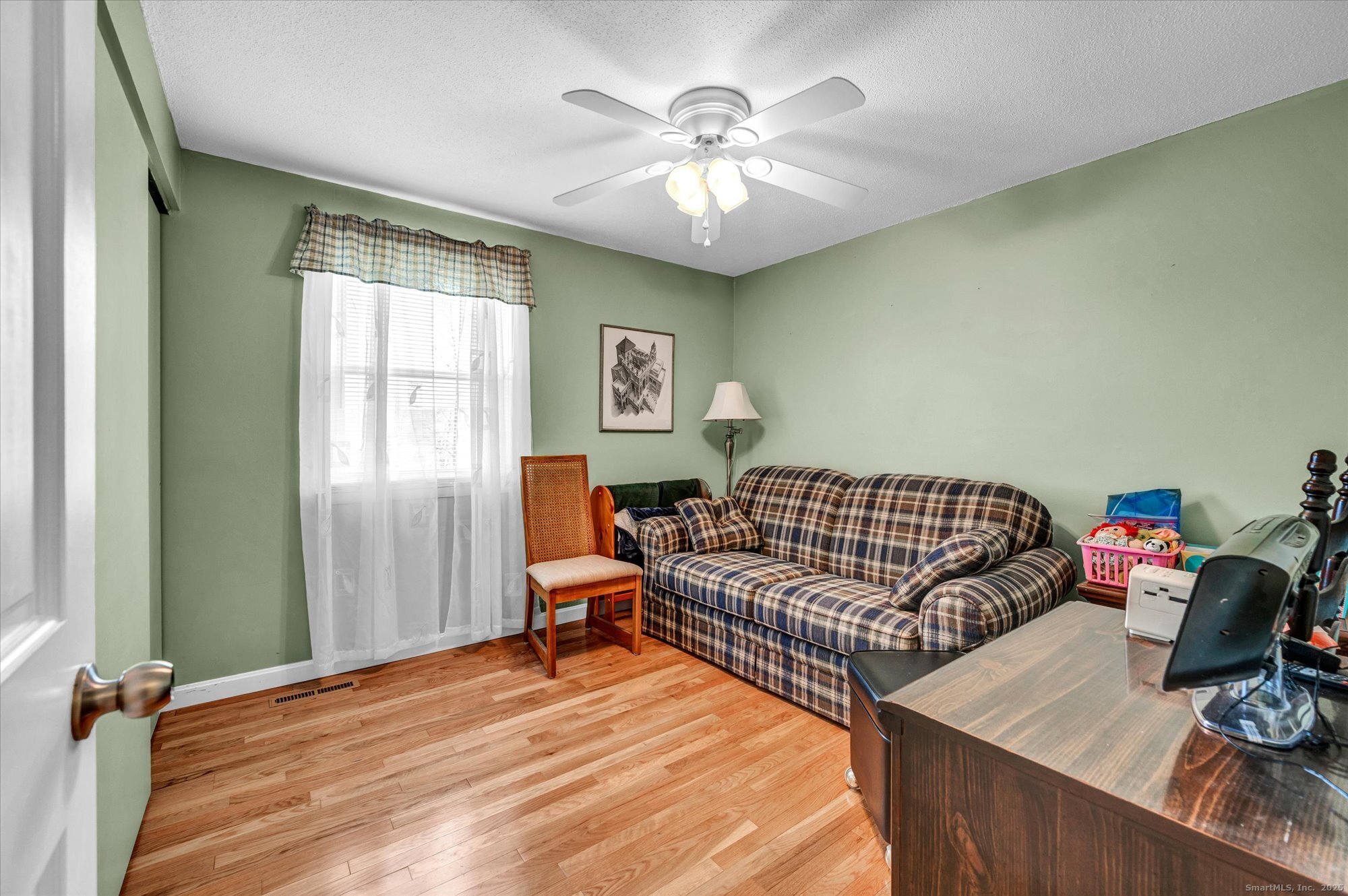 491 Long Hill Road Middletown, CT 06457 - Photo 17 of 27 a bedroom with furniture and a window