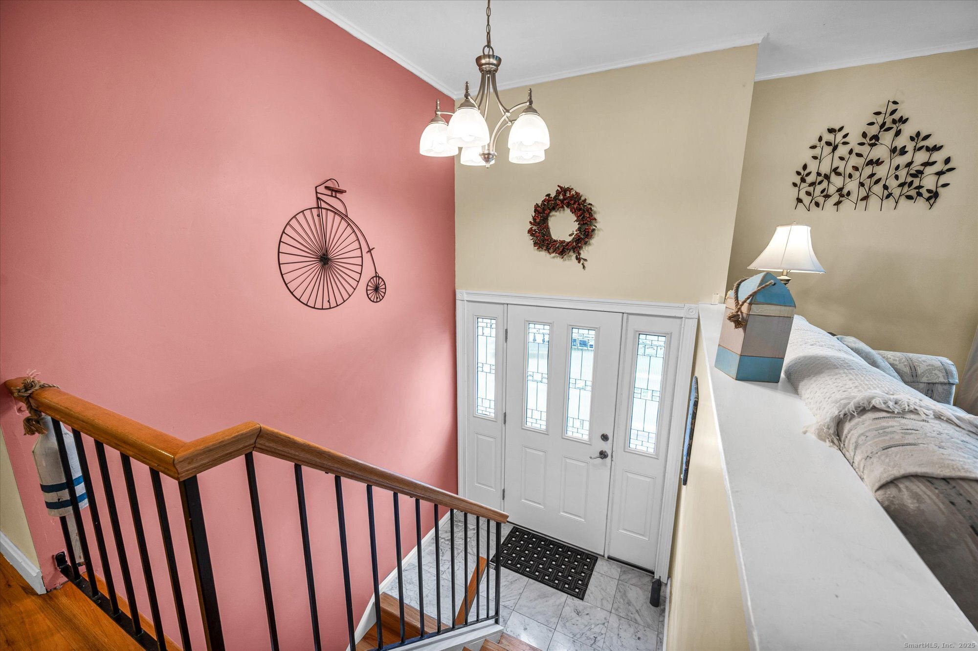 491 Long Hill Road Middletown, CT 06457 - Photo 3 of 27 a view of a hallway to a chandelier