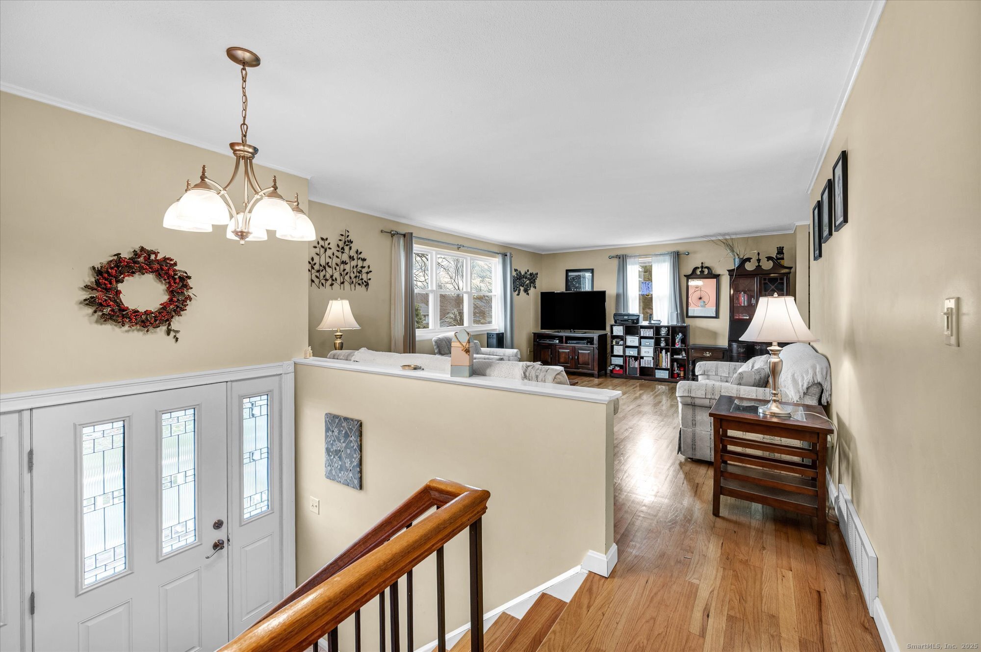 491 Long Hill Road Middletown, CT 06457 - Photo 4 of 27 a living room with furniture and a chandelier