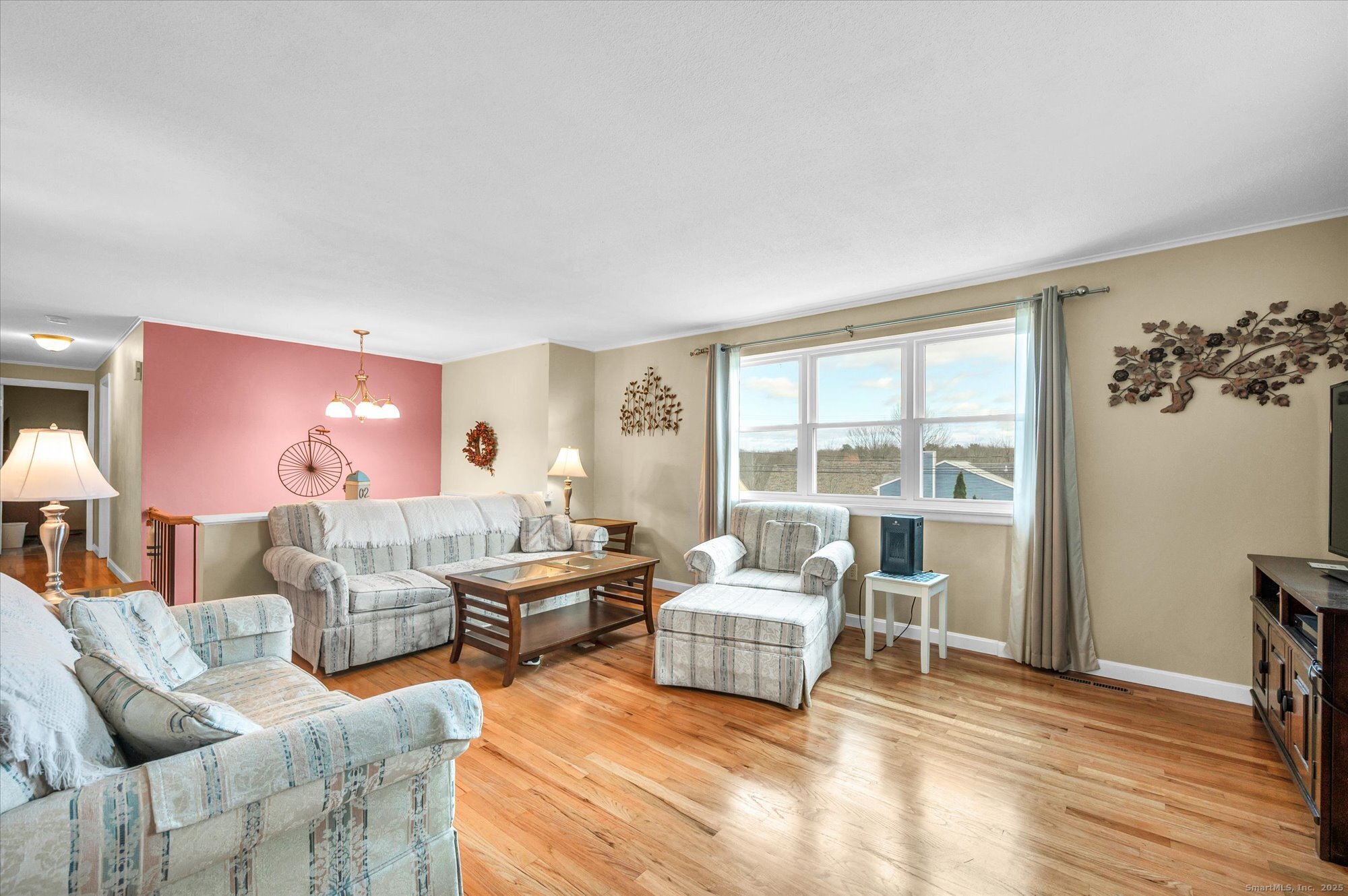 491 Long Hill Road Middletown, CT 06457 - Photo 6 of 27 a living room with furniture and a large window