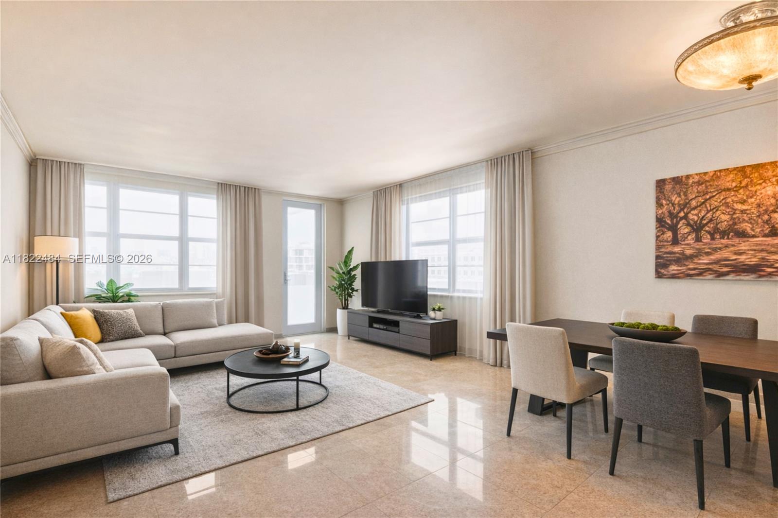 100 Lincoln Road, Unit 811 Miami Beach, FL 33139 - Photo 1 of 29 a living room with furniture and a flat screen tv