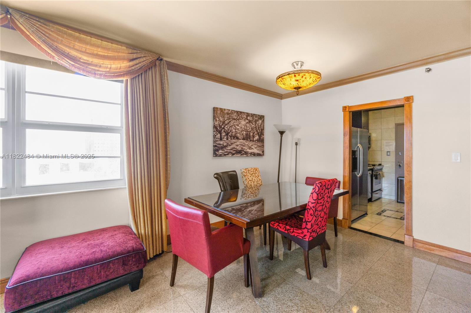 100 Lincoln Road, Unit 811 Miami Beach, FL 33139 - Photo 12 of 36 a living room with furniture and a window