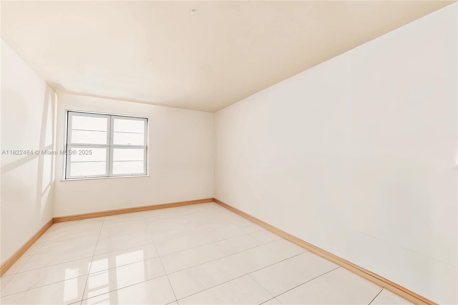 100 Lincoln Road, Unit 811 Miami Beach, FL 33139 - Photo 20 of 36 a view of an empty room with a window