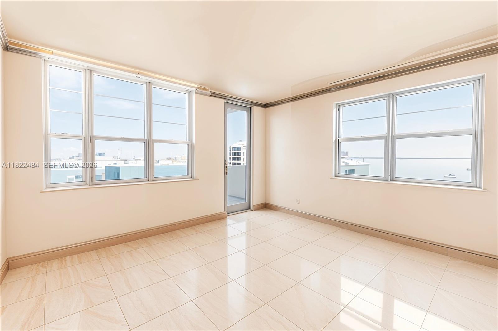 100 Lincoln Road, Unit 811 Miami Beach, FL 33139 - Photo 2 of 29 a view of an empty room with a window