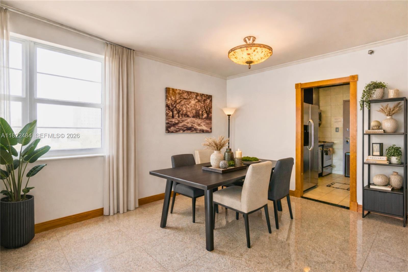 100 Lincoln Road, Unit 811 Miami Beach, FL 33139 - Photo 3 of 29 a view of a workspace room with furniture and a window