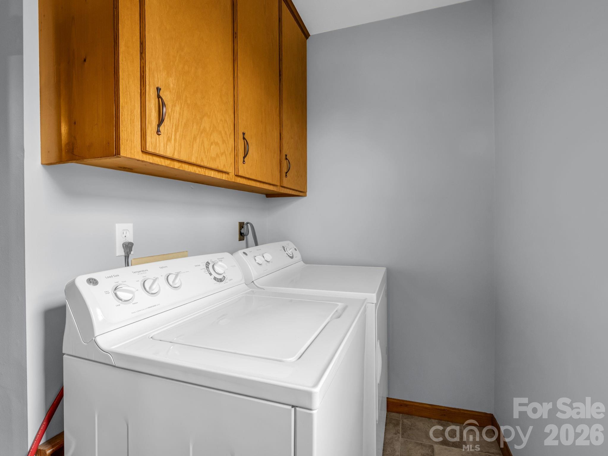 1086 Carters Ridge Road Spruce Pine, NC 28777 - Photo 11 of 48 a utility room with dryer and washer