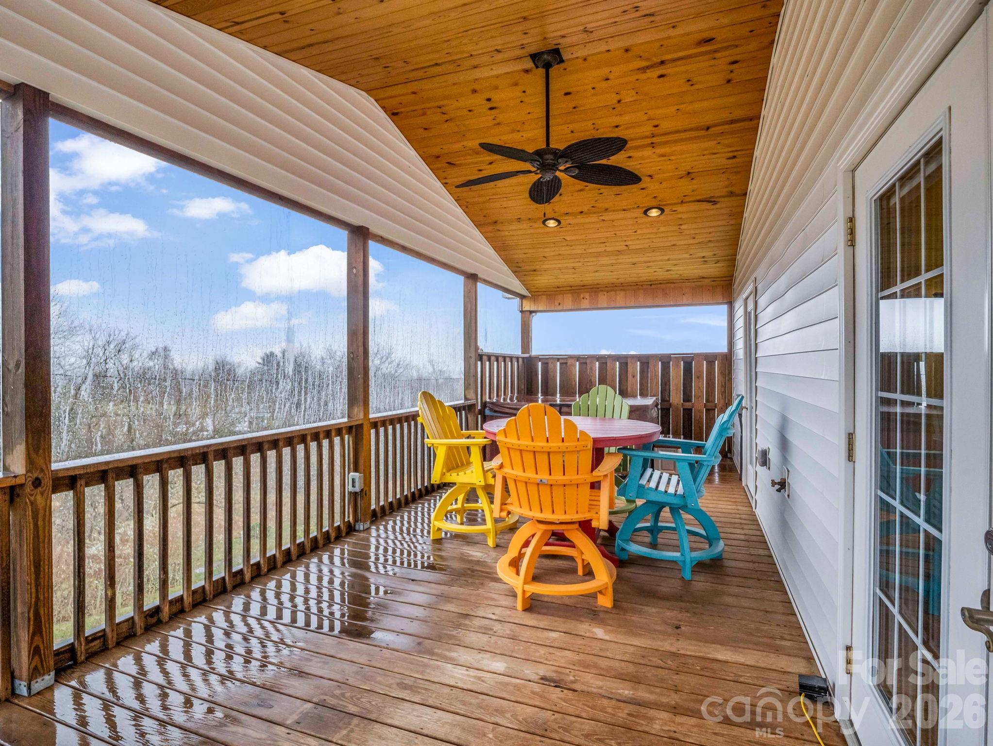 1086 Carters Ridge Road Spruce Pine, NC 28777 - Photo 41 of 48 a view of a two chairs with the view of the house