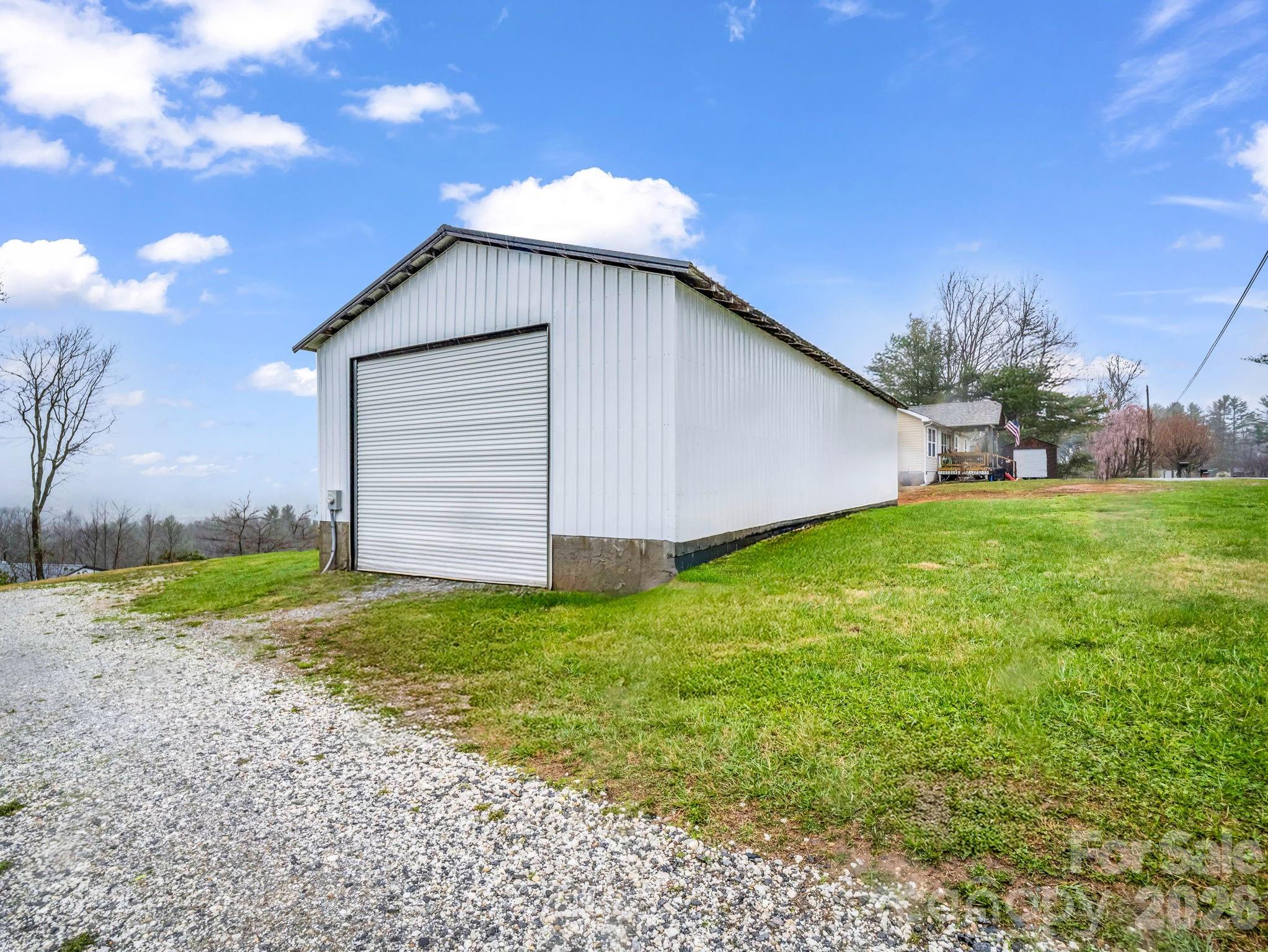 1086 Carters Ridge Road Spruce Pine, NC 28777 - Photo 46 of 48 a house view with backyard space