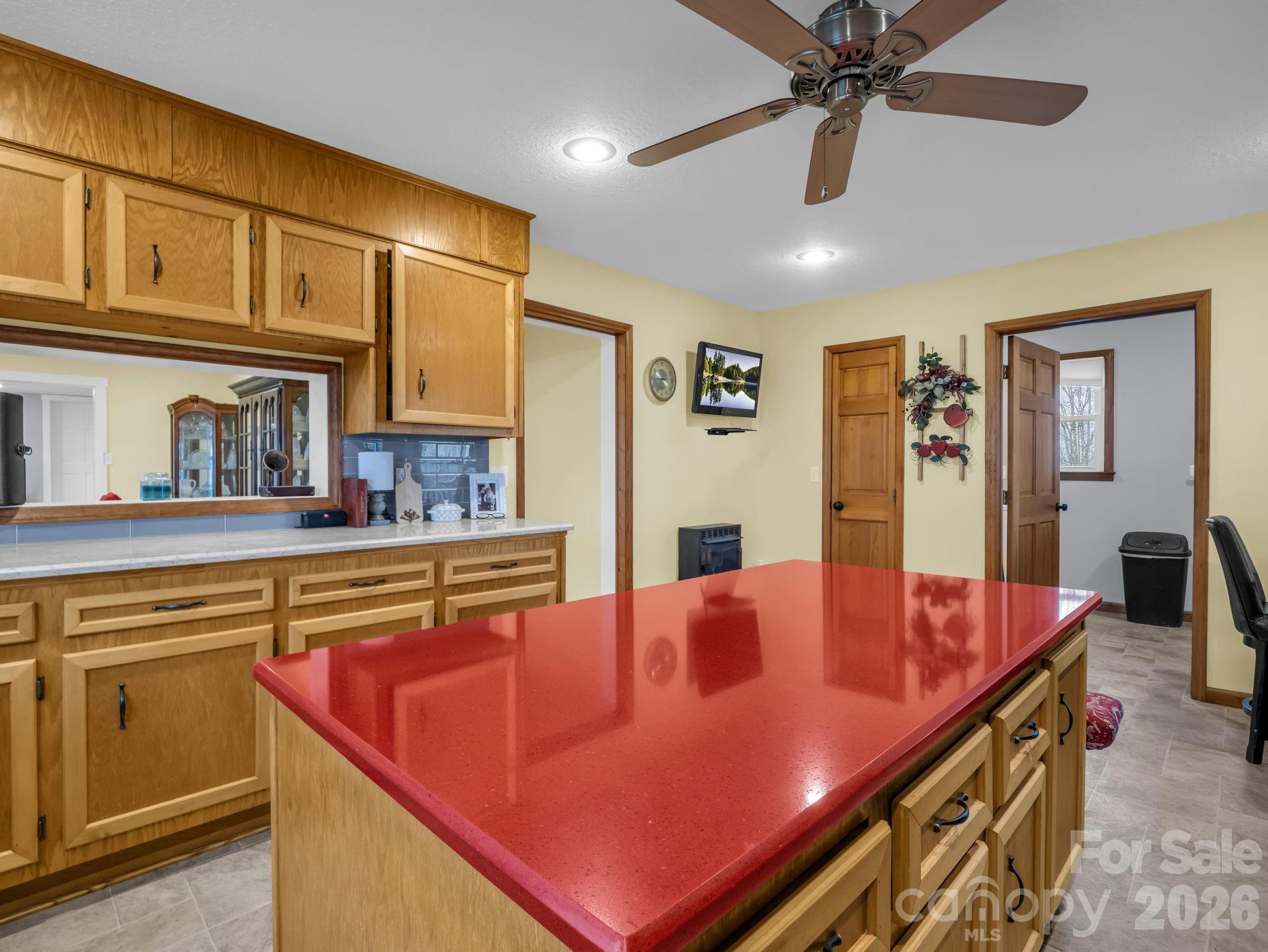 1086 Carters Ridge Road Spruce Pine, NC 28777 - Photo 9 of 48 a living room with stainless steel appliances kitchen island granite countertop furniture and a kitchen view