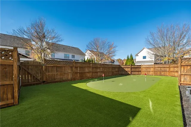 a view of an outdoor space and tennis court
