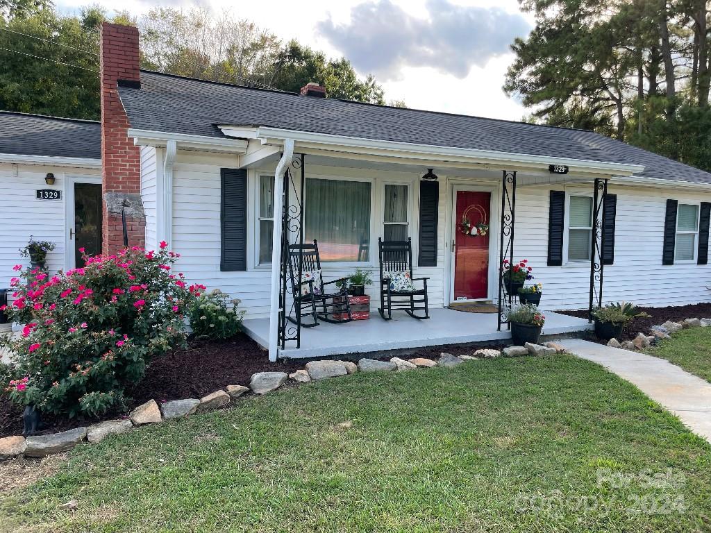 1329 Peach Orchard Road Union, SC 29379 - Photo 1 of 15 front view of a house with a yard