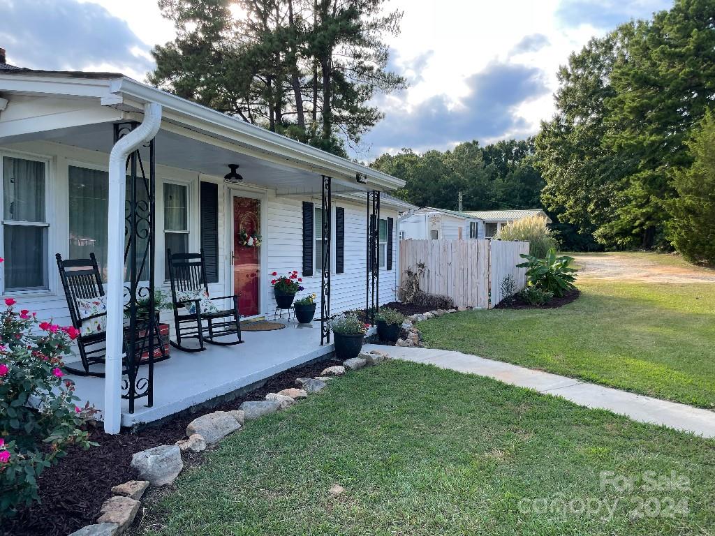 1329 Peach Orchard Road Union, SC 29379 - Photo 2 of 15 a view of a house with backyard and porch