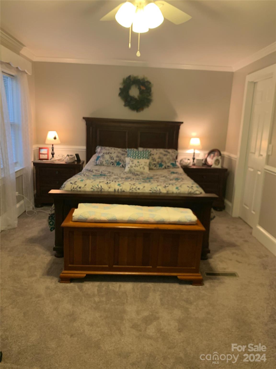1329 Peach Orchard Road Union, SC 29379 - Photo 8 of 15 a bedroom with a bed and a lamp