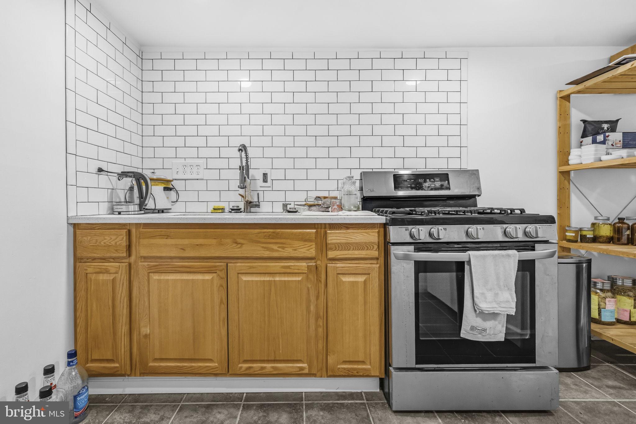 1824 3rd Street Northeast Washington, DC 20002 - Photo 23 of 30 Charming kitchen with modern flair.