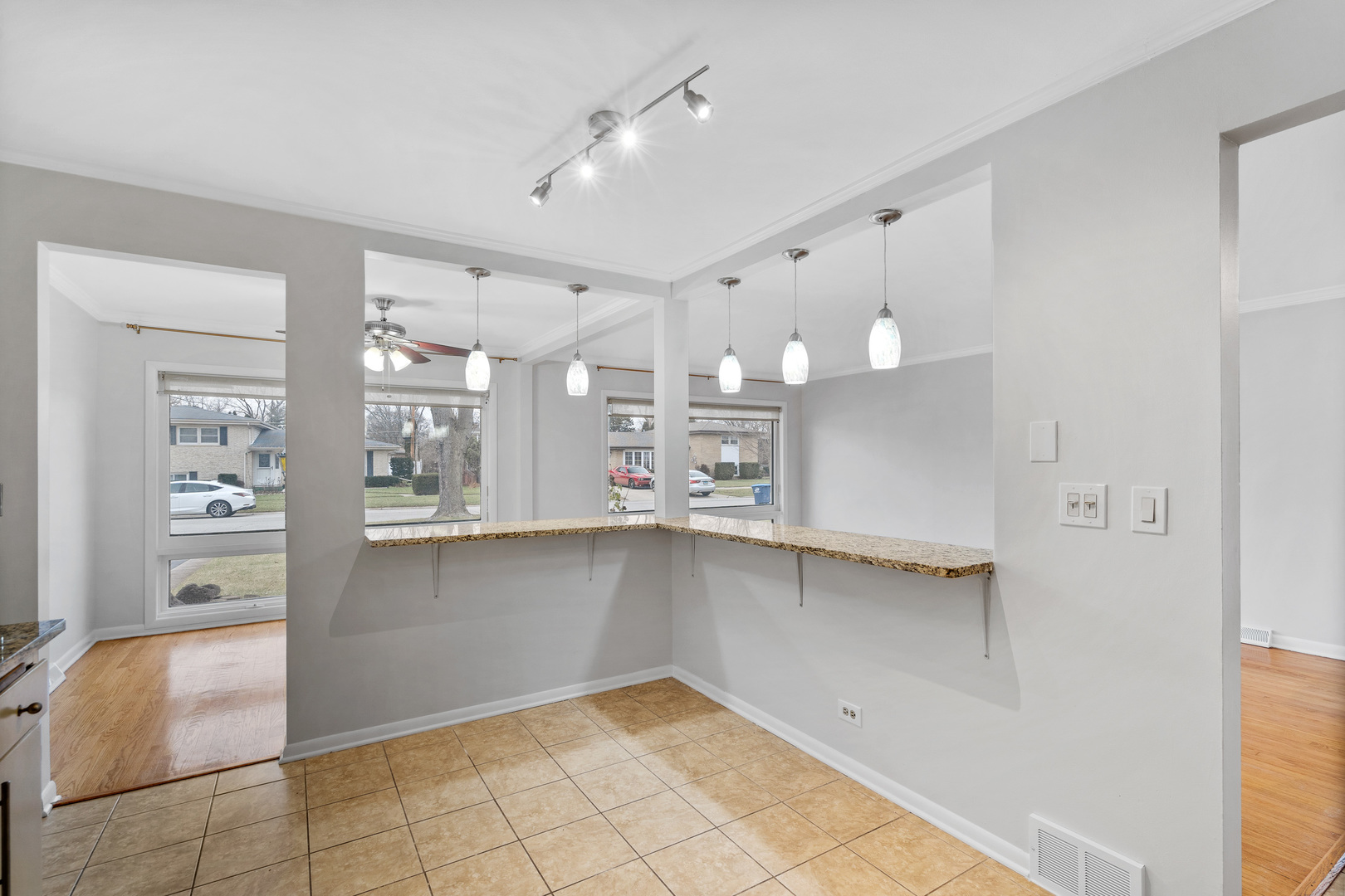 204 Dulles Road Des Plaines, IL 60016 - Photo 12 of 25 a view of a kitchen with refrigerator and window
