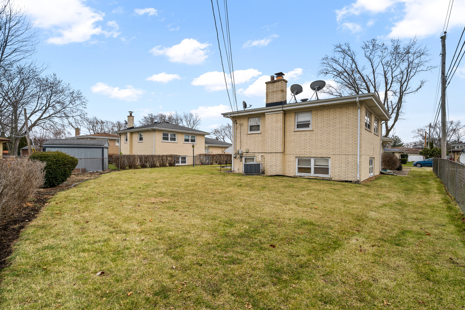 204 Dulles Road Des Plaines, IL 60016 - Photo 2 of 25 a view of a house with a backyard