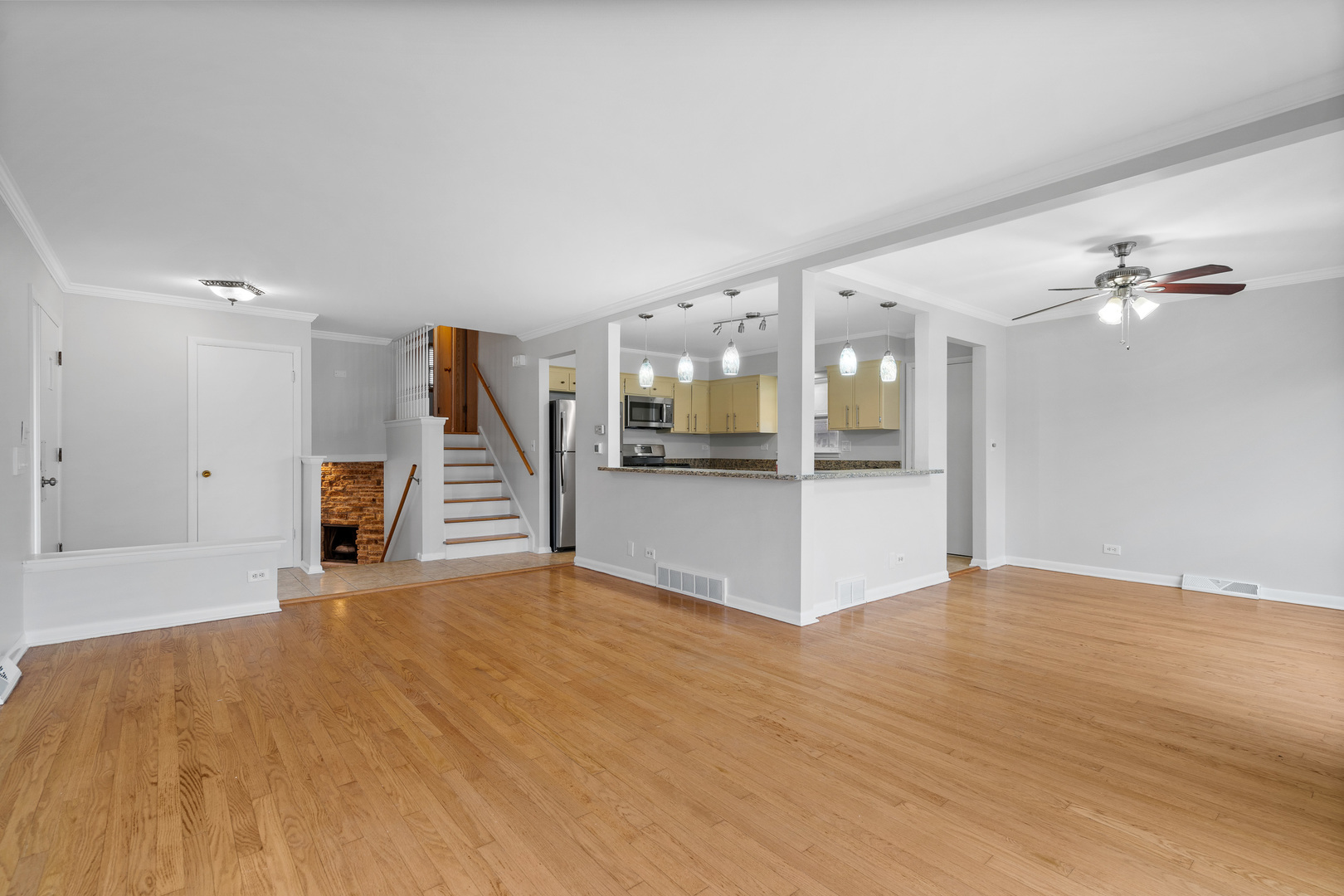204 Dulles Road Des Plaines, IL 60016 - Photo 7 of 25 a view of a kitchen with a sink and a kitchen