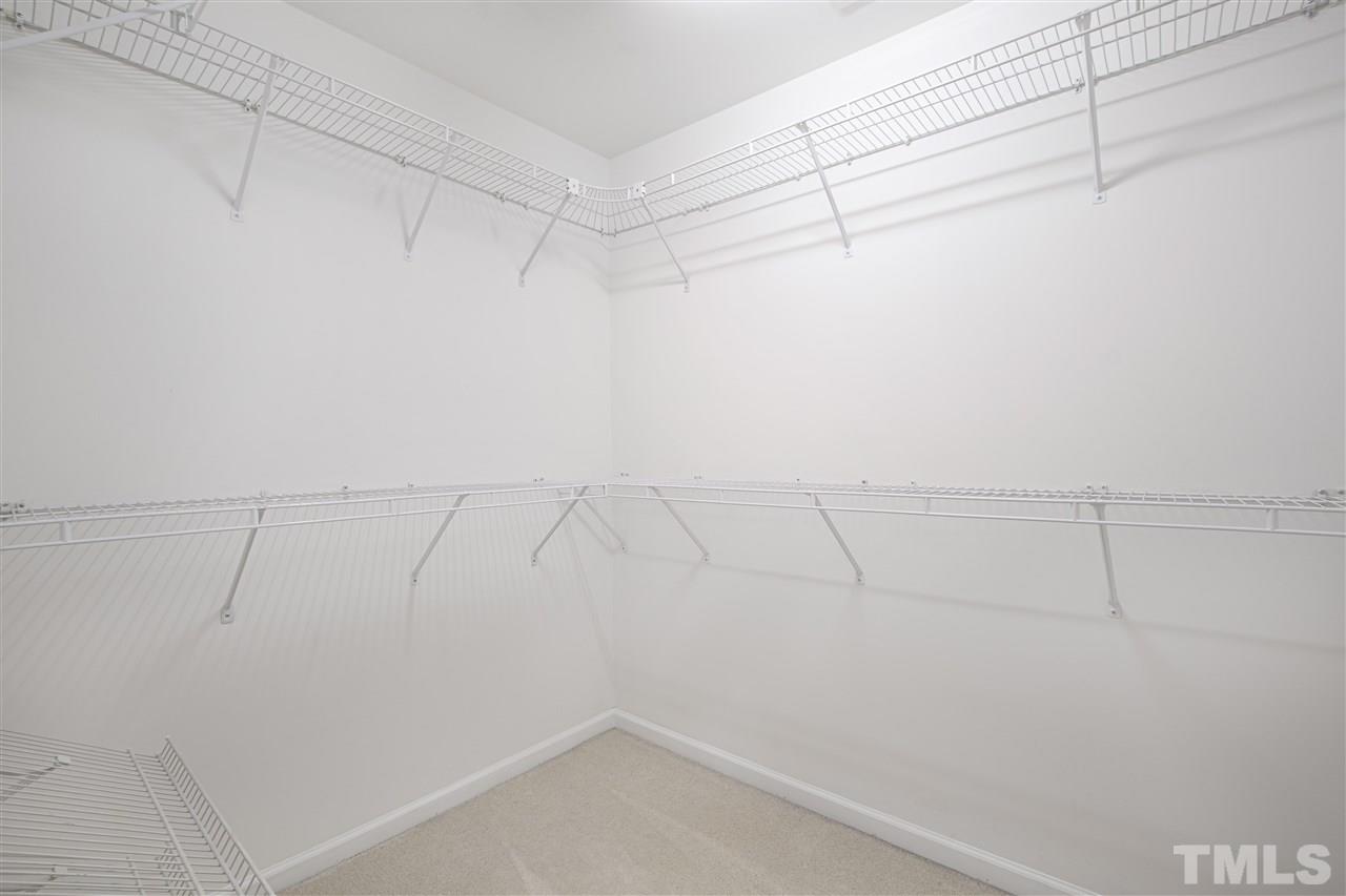 10032 Blackwell Drive Raleigh, NC 27617 - Photo 19 of 28 a view of a room with racks on the wall