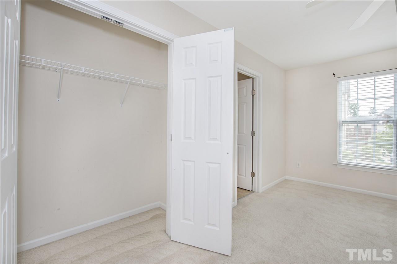 10032 Blackwell Drive Raleigh, NC 27617 - Photo 22 of 28 a view of an empty room with a window