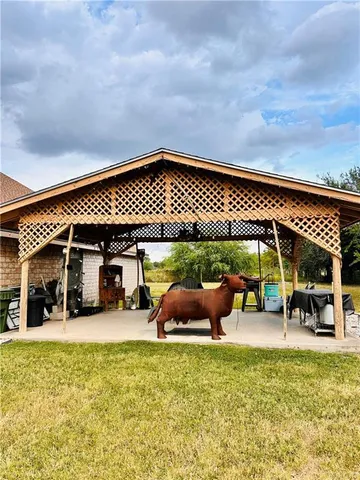 a view of a lake with a houses in the background