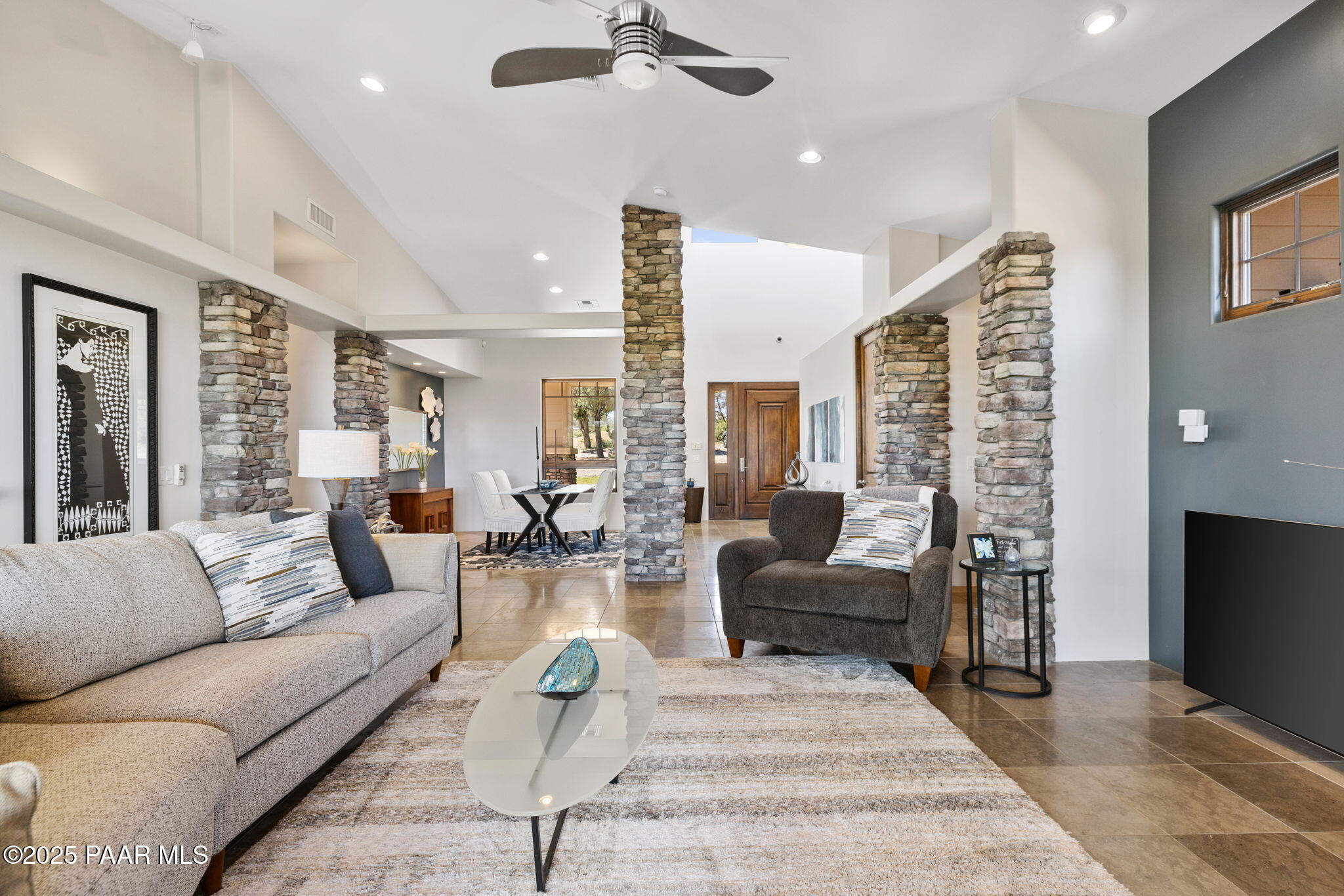 13175 North Bull Run Road Prescott, AZ 86305 - Photo 14 of 60 a living room with furniture and a flat screen tv