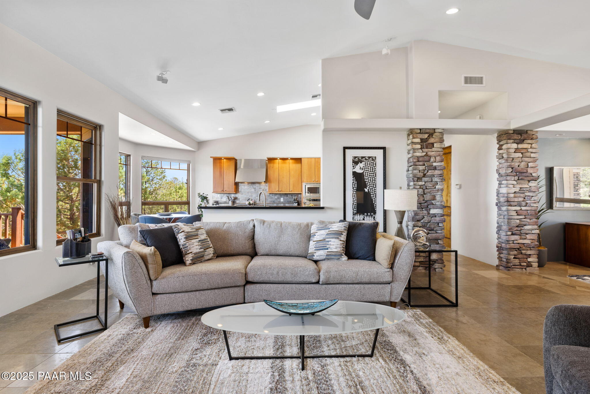 13175 North Bull Run Road Prescott, AZ 86305 - Photo 15 of 60 a living room with furniture kitchen view and a large window