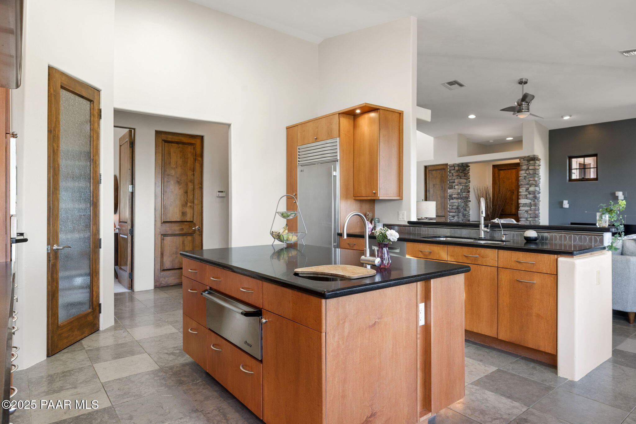 13175 North Bull Run Road Prescott, AZ 86305 - Photo 18 of 60 a kitchen with stainless steel appliances granite countertop a sink and a stove