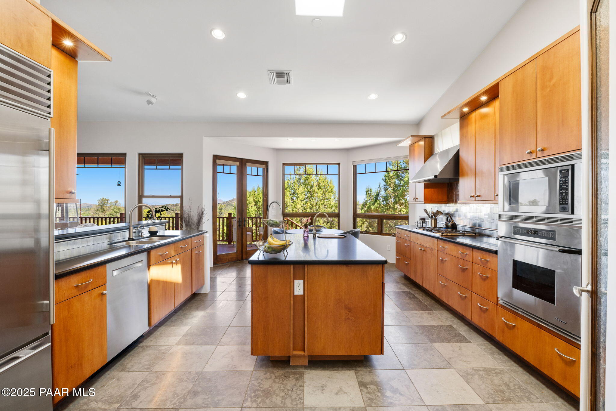 13175 North Bull Run Road Prescott, AZ 86305 - Photo 19 of 60 a large kitchen with stainless steel appliances granite countertop a large counter top stainless steel appliances and cabinets