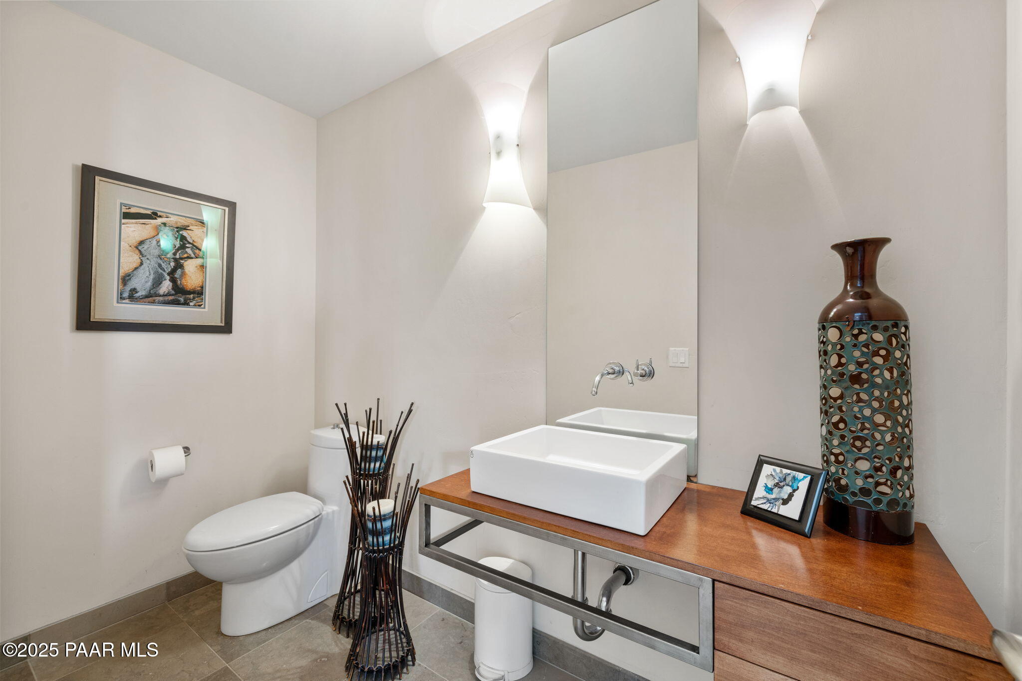 13175 North Bull Run Road Prescott, AZ 86305 - Photo 27 of 60 a bathroom with a toilet a sink and mirror