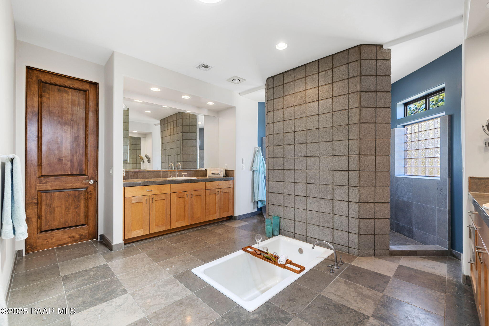 13175 North Bull Run Road Prescott, AZ 86305 - Photo 31 of 60 a bathroom with a double vanity sink and a mirror