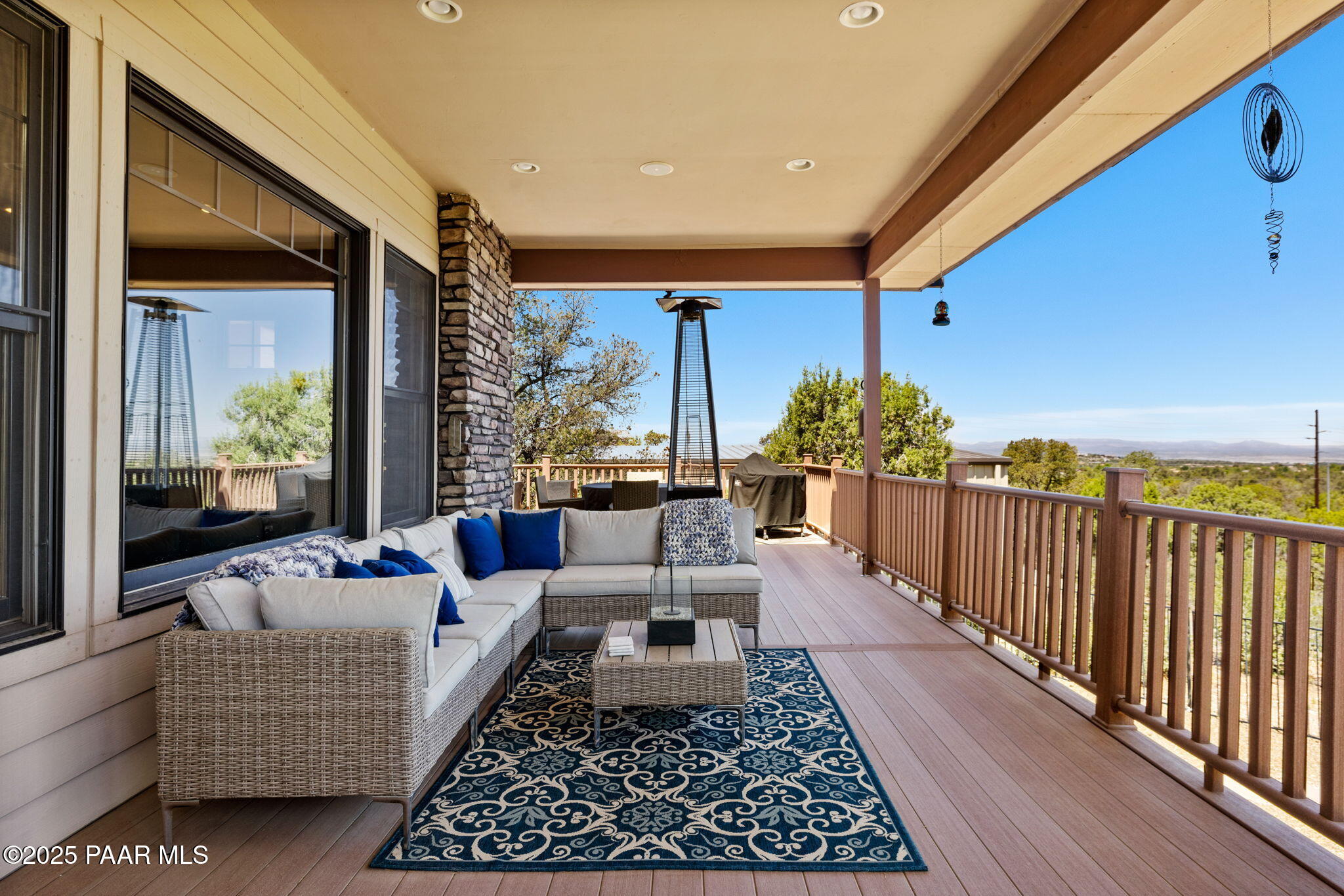 13175 North Bull Run Road Prescott, AZ 86305 - Photo 41 of 60 a balcony with furniture and a potted plant