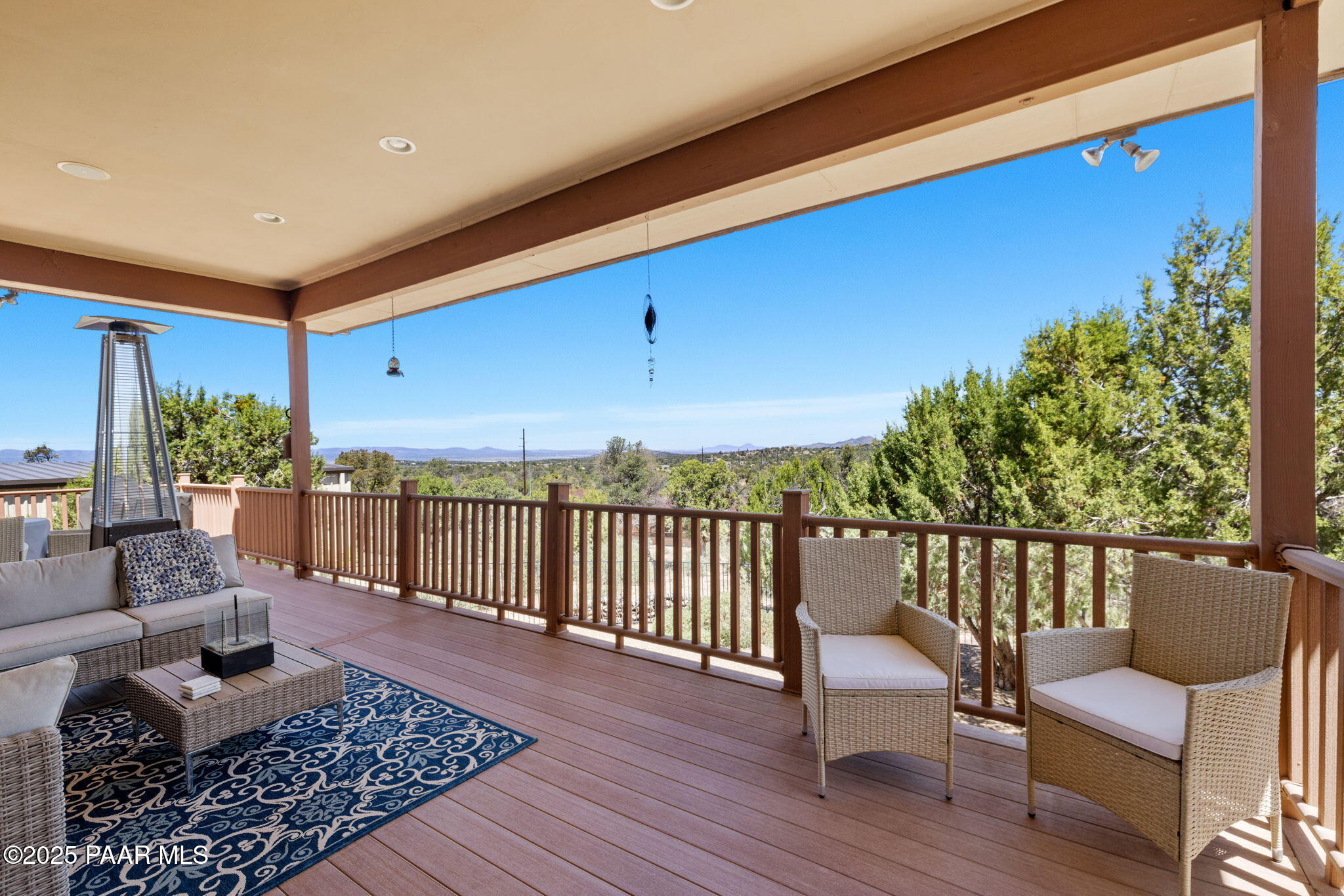13175 North Bull Run Road Prescott, AZ 86305 - Photo 42 of 60 a balcony with wooden floor and furniture