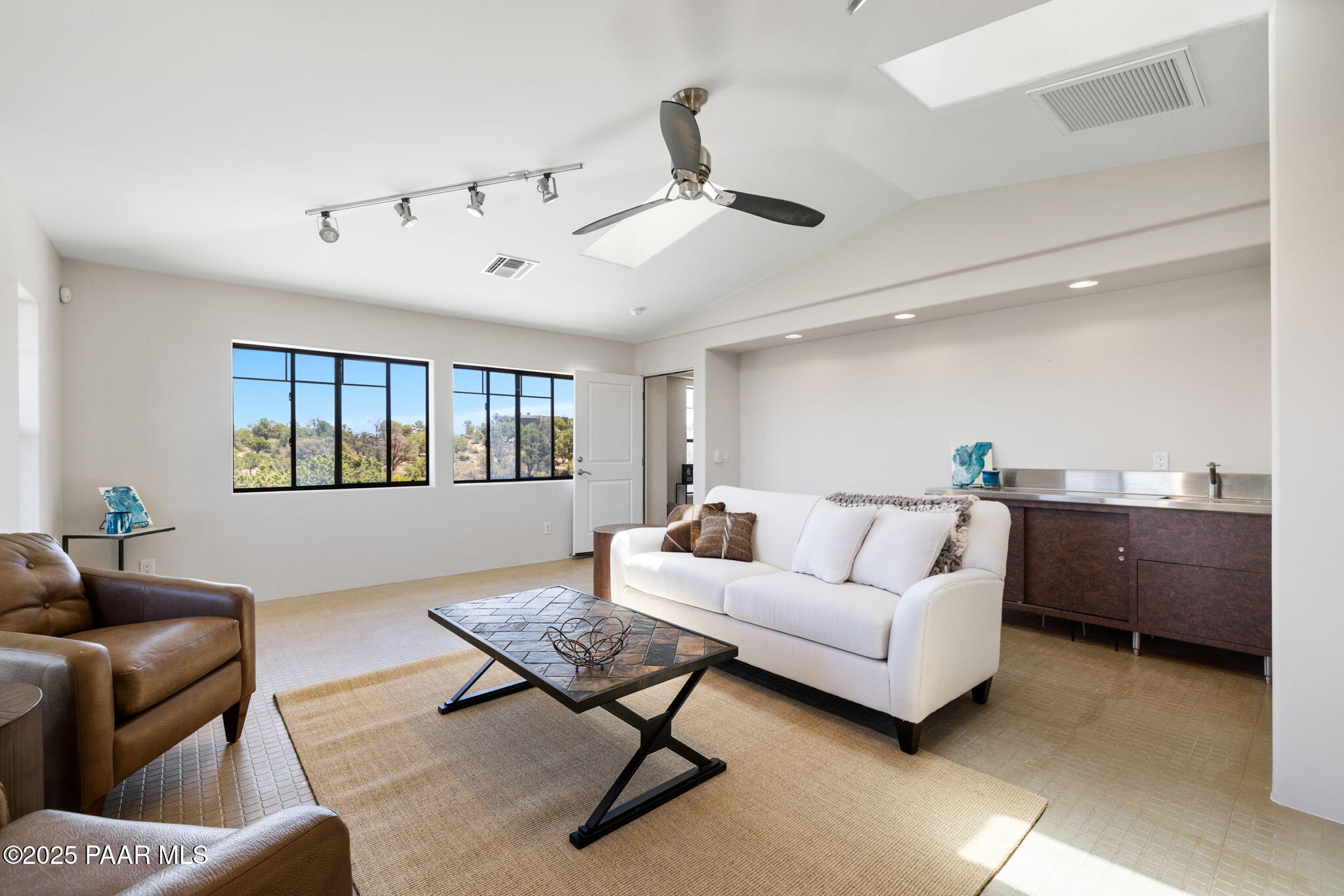 13175 North Bull Run Road Prescott, AZ 86305 - Photo 49 of 60 a living room with furniture and a window