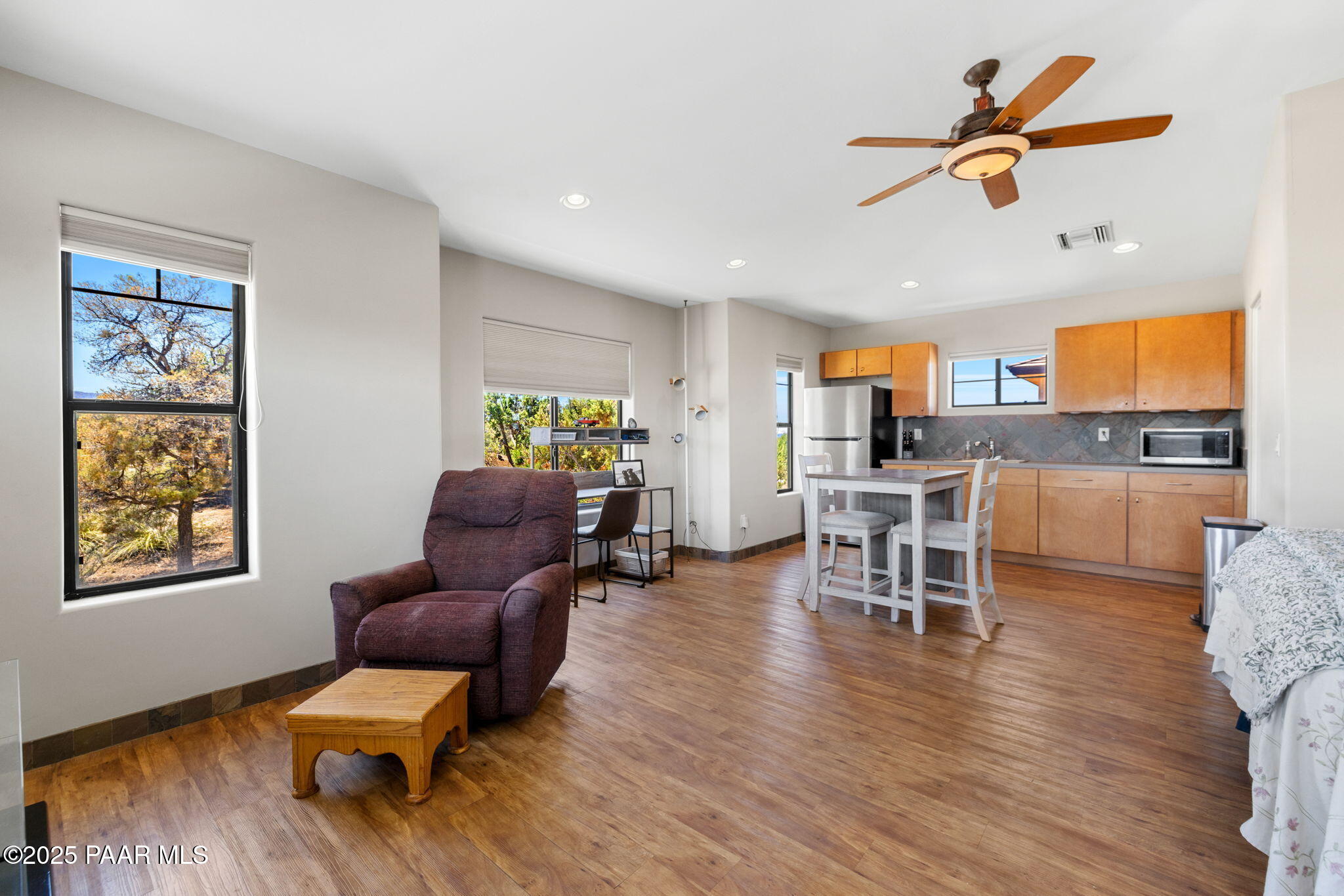 13175 North Bull Run Road Prescott, AZ 86305 - Photo 50 of 60 a living room with furniture and wooden floor