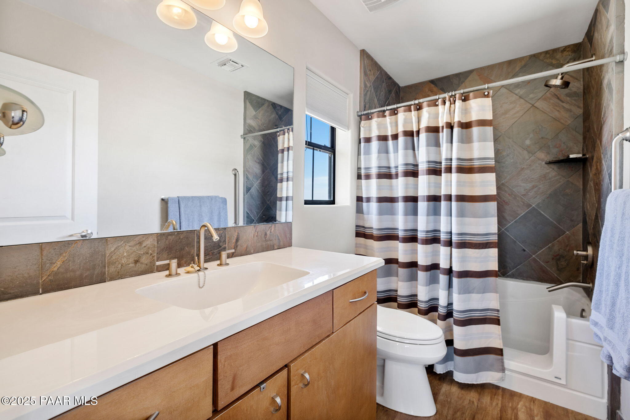13175 North Bull Run Road Prescott, AZ 86305 - Photo 52 of 60 a bathroom with a sink a toilet and shower