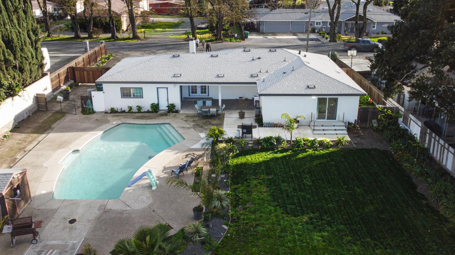 9115 East Southland Road Manteca, CA 95336 - Photo 49 of 52 a aerial view of a house next to a yard