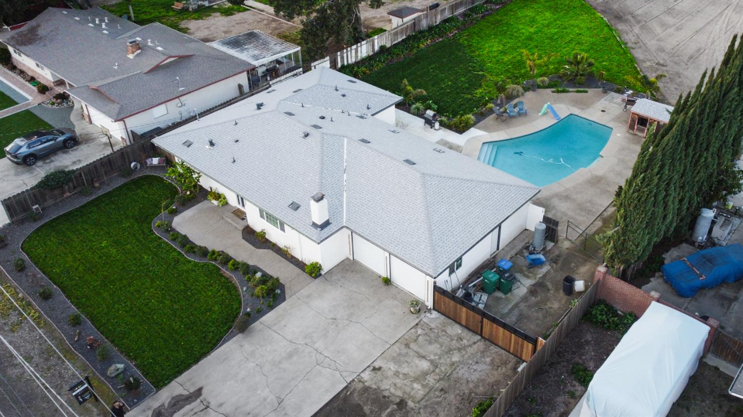 9115 East Southland Road Manteca, CA 95336 - Photo 51 of 52 an aerial view of a house with a yard