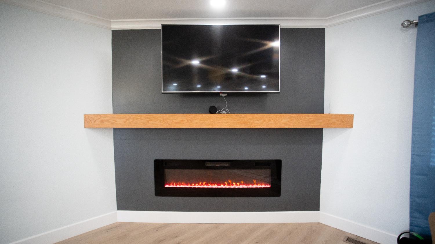 9115 East Southland Road Manteca, CA 95336 - Photo 7 of 52 a room with fireplace and outdoor space