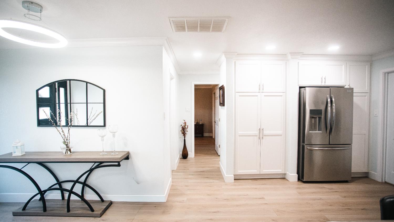 9115 East Southland Road Manteca, CA 95336 - Photo 9 of 52 a kitchen with stainless steel appliances granite countertop a refrigerator and a sink