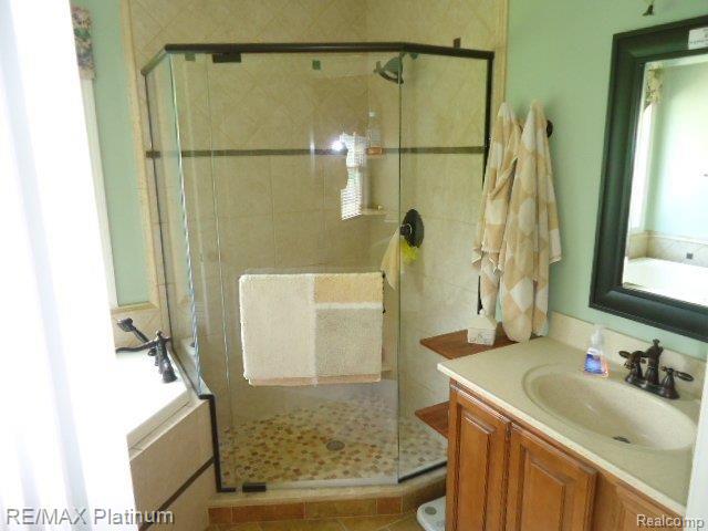 3799 Charles Huff Road Howell, MI 48855 - Photo 13 of 24 MASTER BATH CERAMIC SHOWER