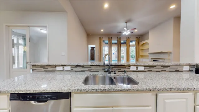 an empty room with windows and entrance