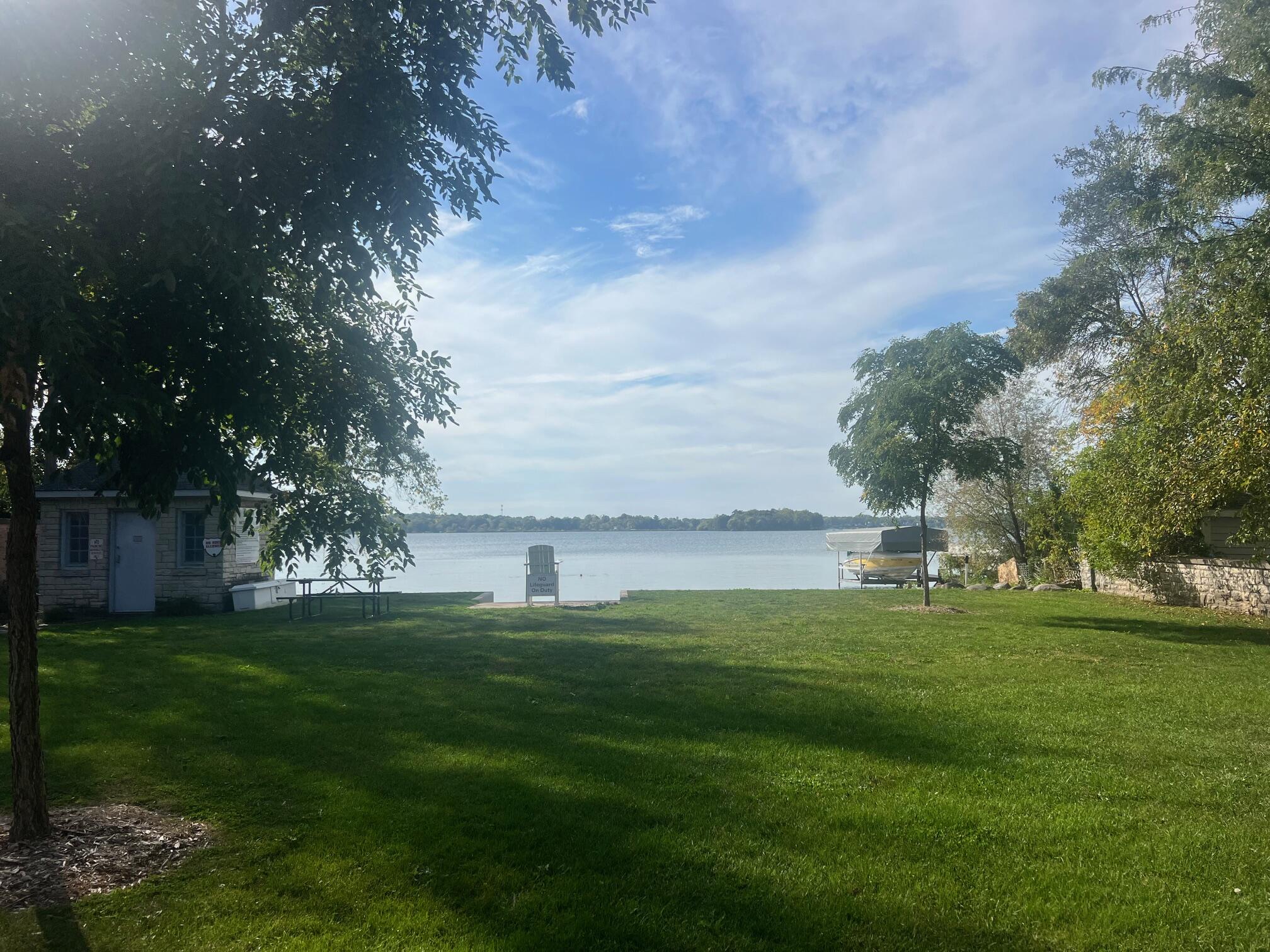 W379N5686 North Lake Road, Unit 1 Oconomowoc, WI 53066 - Photo 3 of 12 Lac La Belle Beach nearby