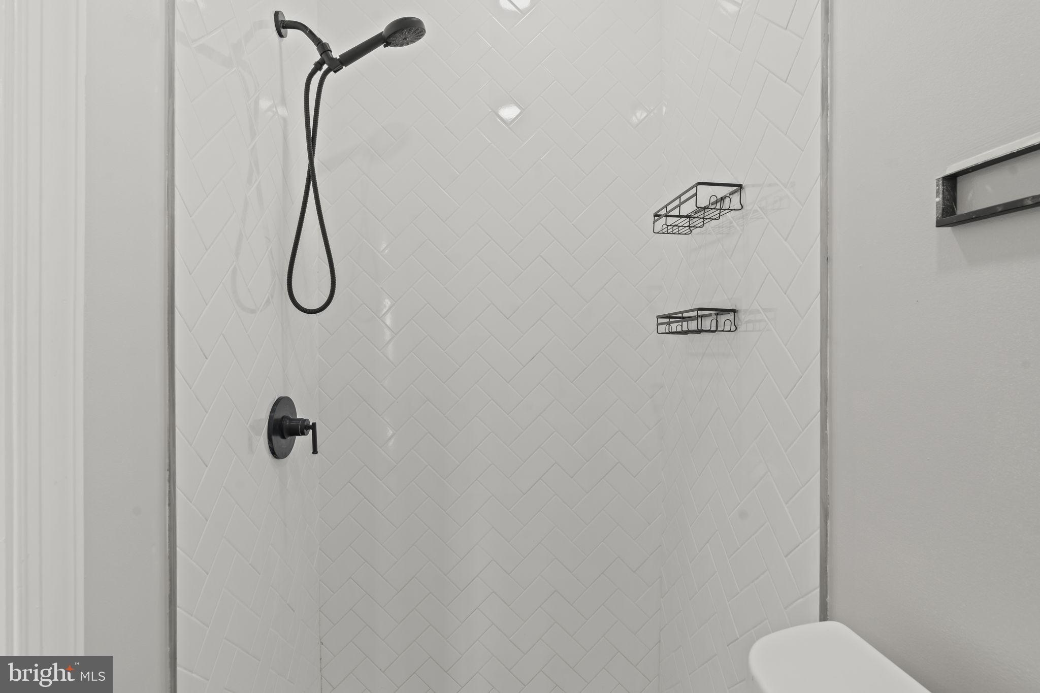 5237 Chester Avenue, Unit 3 Philadelphia, PA 19143 - Photo 27 of 35 a bathroom with a shower