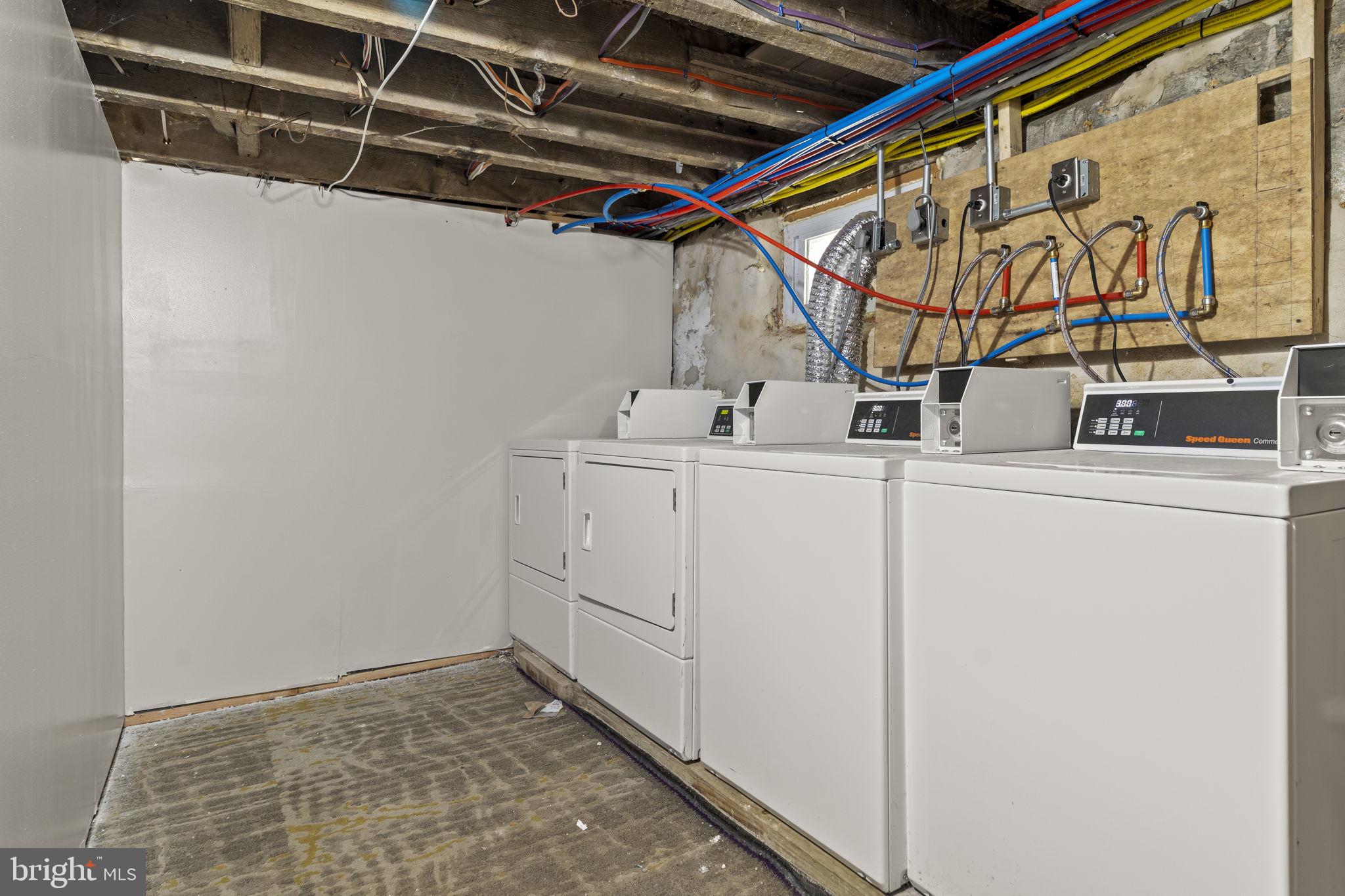 5237 Chester Avenue, Unit 3 Philadelphia, PA 19143 - Photo 29 of 35 a utility room with dryer and washer
