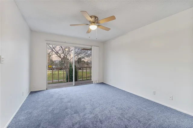 a view of a balcony with lake view and wooden floor