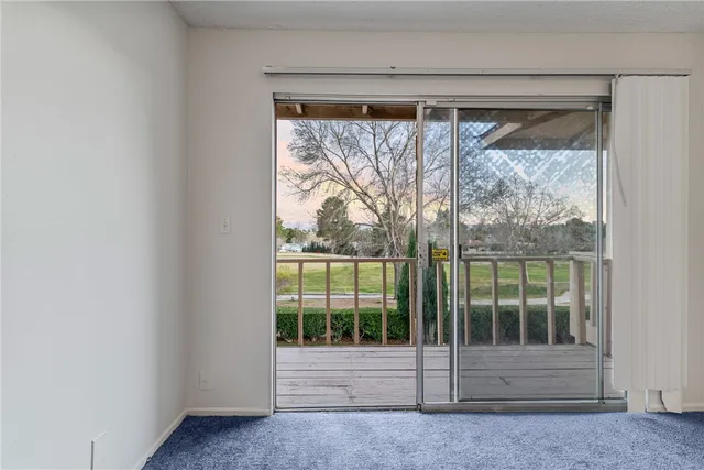a spacious bathroom with a double vanity sink a mirror and a